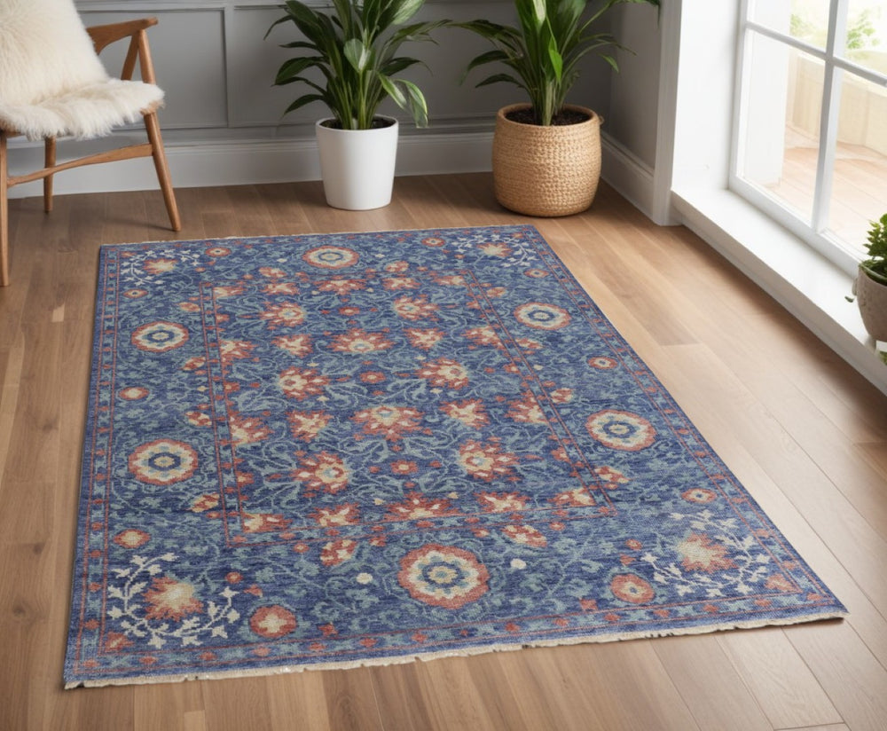 HomeRoots 4' Elegant Wool Floral Hand-Knotted Area Rug in Blue and Beige for Timeless Home Comfort and Style 4' X 6' 513118
