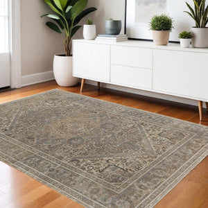 HomeRoots 4' Brown and Ivory Medallion Distressed Area Rug - Vintage Charm with Non-Slip Backing for Everyday Use 4' X 6' 513135