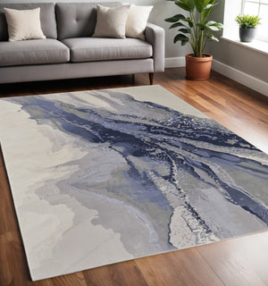 HomeRoots 4' Blue Gray and Ivory Abstract Area Rug - Stylish Modern Design for High-Traffic Spaces and Durability 5' X 8' 513170