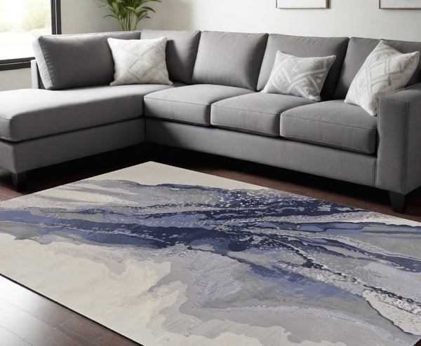 HomeRoots 4' Blue Gray and Ivory Abstract Area Rug - Stylish Modern Design for High-Traffic Spaces and Durability 8' X 10' 513171