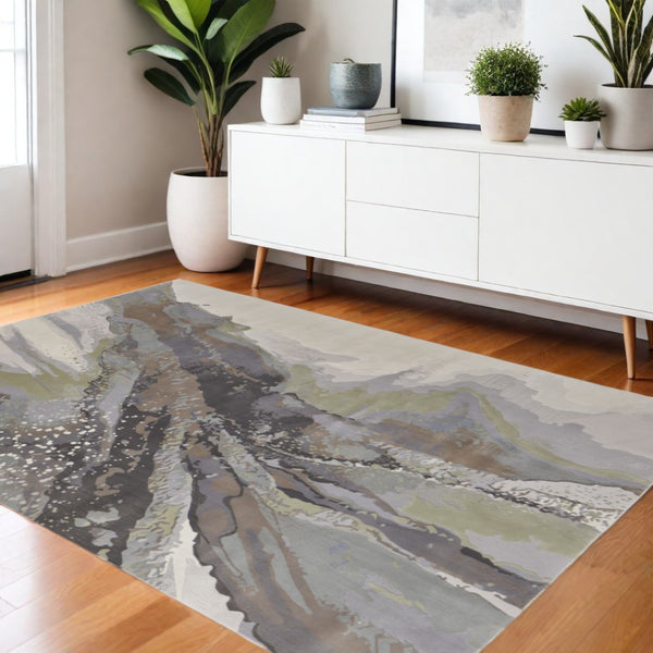 HomeRoots 4' Blue Gray and Ivory Abstract Area Rug - Stylish Modern Design for High-Traffic Spaces and Durability 4' X 6' 513177