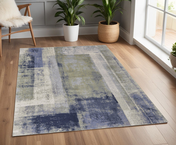 Homeroots 4' X 6' Blue And Ivory Abstract Power Loom Distressed Area Rug  Polypropylene 513185