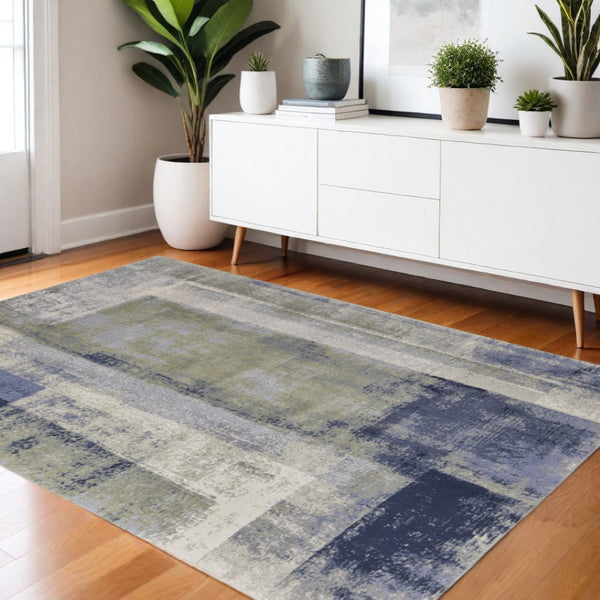 HomeRoots 4' Blue Green Ivory Abstract Distressed Area Rug - Elegant Modern Design for Stylish Home Decor 4' X 6' 513185