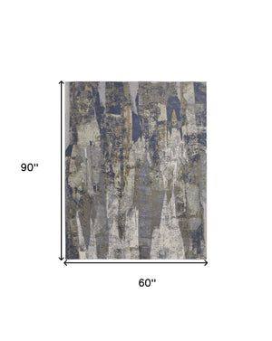 Homeroots 5' X 8' Blue And Gray Abstract Power Loom Distressed Area Rug Blue,Gray,Tan Polypropylene 513210