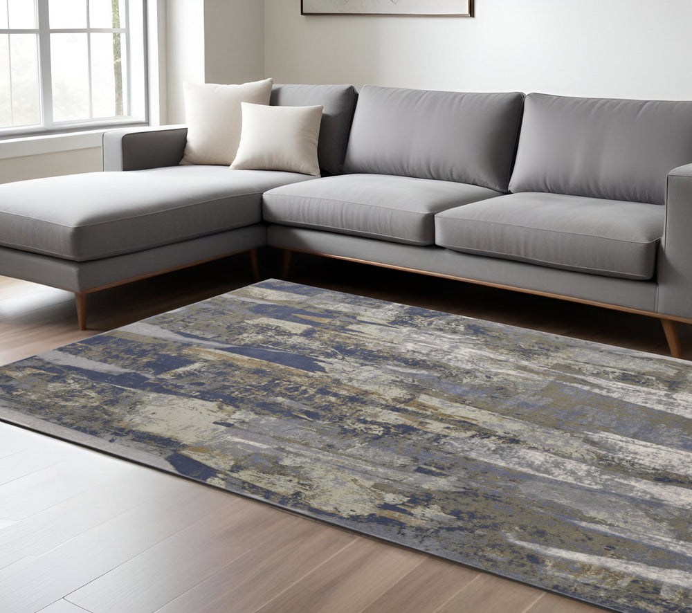 Homeroots 8' X 10' Blue And Gray Abstract Power Loom Distressed Area Rug Blue,Gray,Tan Polypropylene 513211
