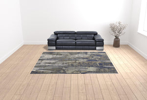 Homeroots 9' X 12' Blue Gray And Tan Abstract Power Loom Distressed Area Rug Blue,Gray,Tan Polypropylene 513212