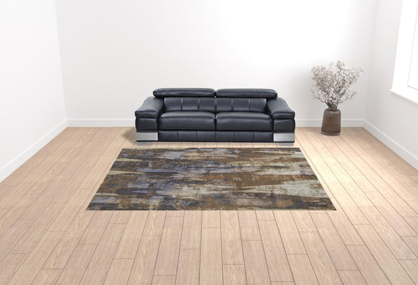 Homeroots 9' X 12' Brown Blue And Ivory Abstract Power Loom Distressed Area Rug Brown,Blue,Ivory Polypropylene 513220