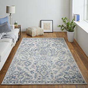 Homeroots 8' X 10' Blue Gray And Ivory Floral Power Loom Distressed Area Rug Blue,Gray,Ivory Polypropylene 513283