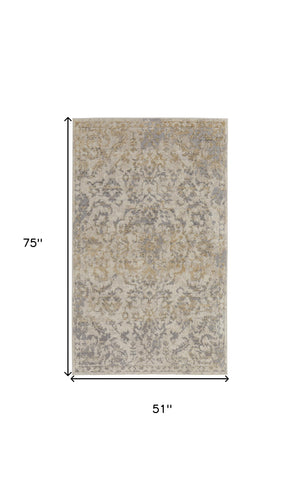 Homeroots 4' X 6' Gray Ivory And Gold Floral Power Loom Distressed Area Rug Gray,Ivory,Gold Polypropylene 513285