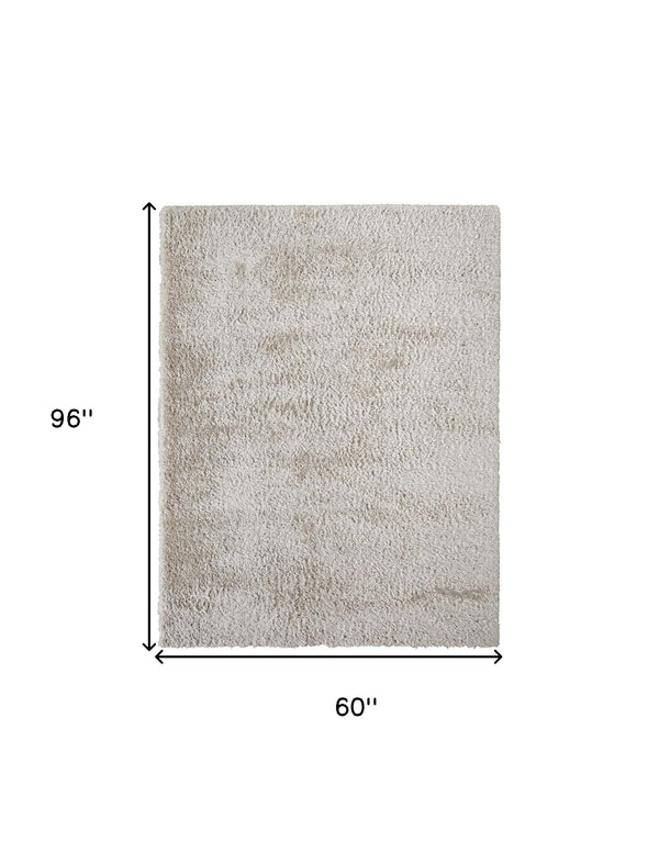 Homeroots 5' X 8' Ivory Shag Power Loom Stain Resistant Area Rug Ivory Polyester 513414