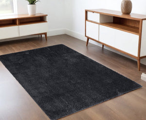 Homeroots 4' X 6' Black Shag Power Loom Area Rug Black Polypropylene,Polyester 513420