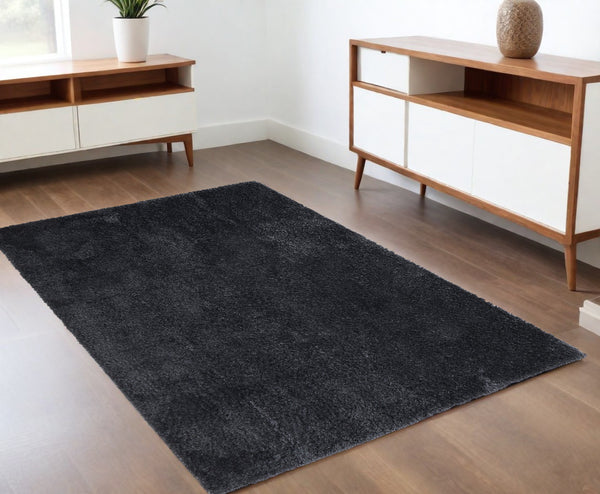 Homeroots 4' X 6' Black Shag Power Loom Area Rug Black Polypropylene,Polyester 513420