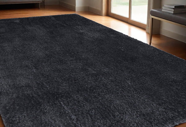 Homeroots 5' X 8' Black Shag Power Loom Area Rug Black Polypropylene,Polyester 513421