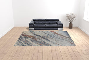HomeRoots 10' Abstract Area Rug in Ivory, Orange & Blue - Stain Resistant, Modern Design for Stylish Spaces 10' X 14' 513465