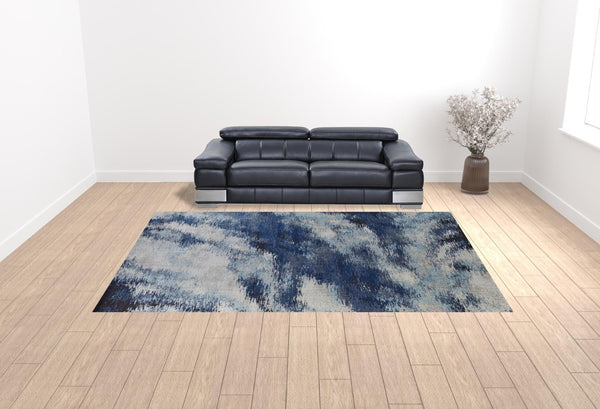 HomeRoots 10' Blue and Ivory Abstract Area Rug - Durable, Stain Resistant Power Loom Design for Stylish Spaces 10' X 14' 513519