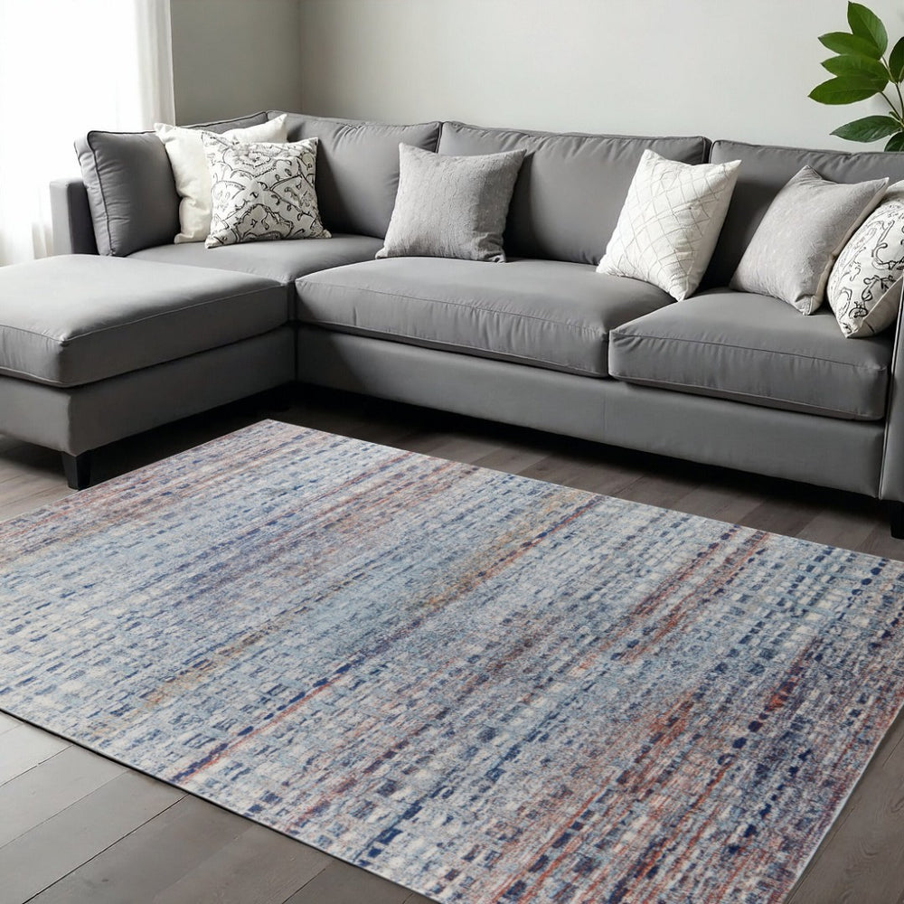 HomeRoots 10' Abstract Area Rug in Ivory, Blue, and Orange – Stylish, Stain-Resistant Design for Modern Homes 10' X 14' 513530