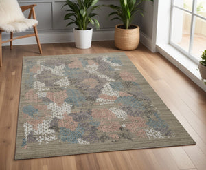 HomeRoots 4' Hand-Woven Pink and Blue Abstract Area Rug - Unique Distressed Design for Cozy Living Spaces 4' X 6' 513589