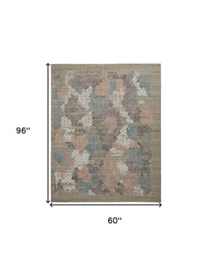 HomeRoots 4' Hand-Woven Pink and Blue Abstract Area Rug - Unique Distressed Design for Cozy Living Spaces 5' X 8' 513590