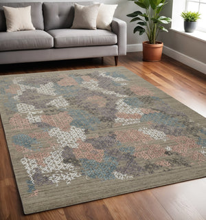 HomeRoots 4' Hand-Woven Pink and Blue Abstract Area Rug - Unique Distressed Design for Cozy Living Spaces 5' X 8' 513590