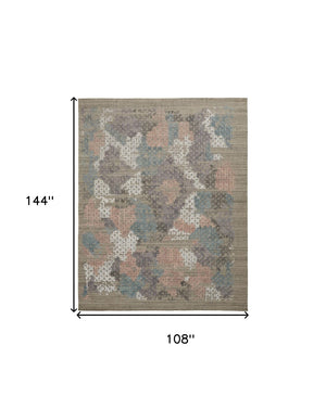 HomeRoots 4' Hand-Woven Pink and Blue Abstract Area Rug - Unique Distressed Design for Cozy Living Spaces 9' X 12' 513592