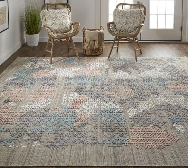 HomeRoots 4' Hand-Woven Pink and Blue Abstract Area Rug - Unique Distressed Design for Cozy Living Spaces 9' X 12' 513592