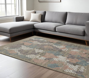 HomeRoots 4' Hand-Woven Pink and Blue Abstract Area Rug - Unique Distressed Design for Cozy Living Spaces 10' X 14' 513593
