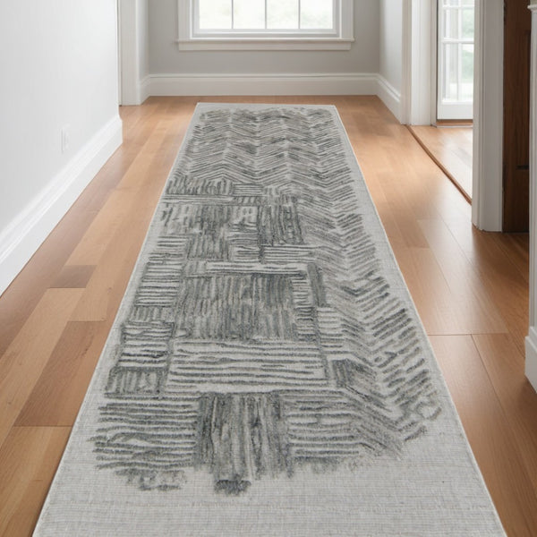 HomeRoots 4' Hand-Woven Blue and Ivory Abstract Area Rug for Modern Coastal Living - Unique Artisan Design 10' Runner 513603
