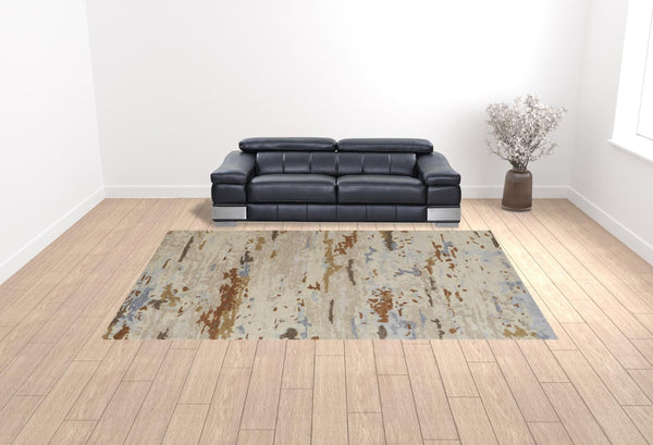 HomeRoots 4' Handmade Wool Area Rug with Tan and Blue Abstract Design - Stain Resistant for Modern Homes 10' X 14' 513625