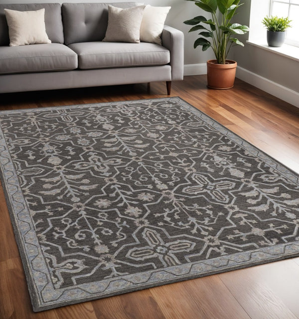 HomeRoots 5' Elegant Blue Gray Floral Hand-Tufted Wool Area Rug - Durable, Stain-Resistant, Unique Design 5' X 8' 513668