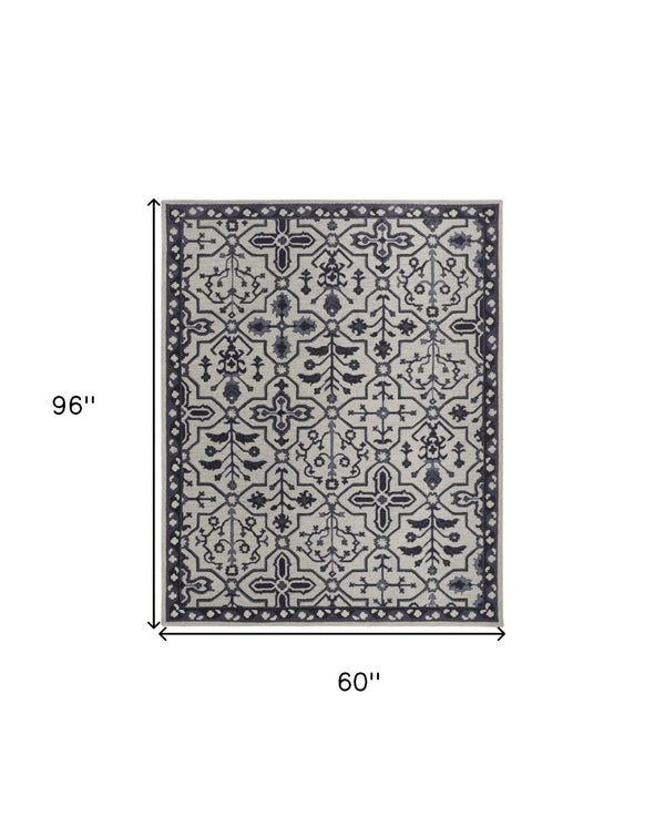HomeRoots 5' Elegant Blue Gray Floral Hand-Tufted Wool Area Rug - Durable, Stain-Resistant, Unique Design 5' X 8' 513674