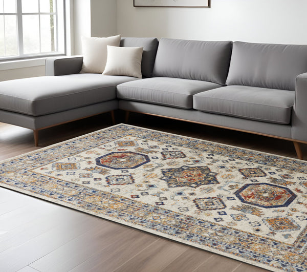 Homeroots 7' X 10' Ivory And Blue Floral Non Skid Area Rug Ivory,Orange,Blue Polypropylene 513800