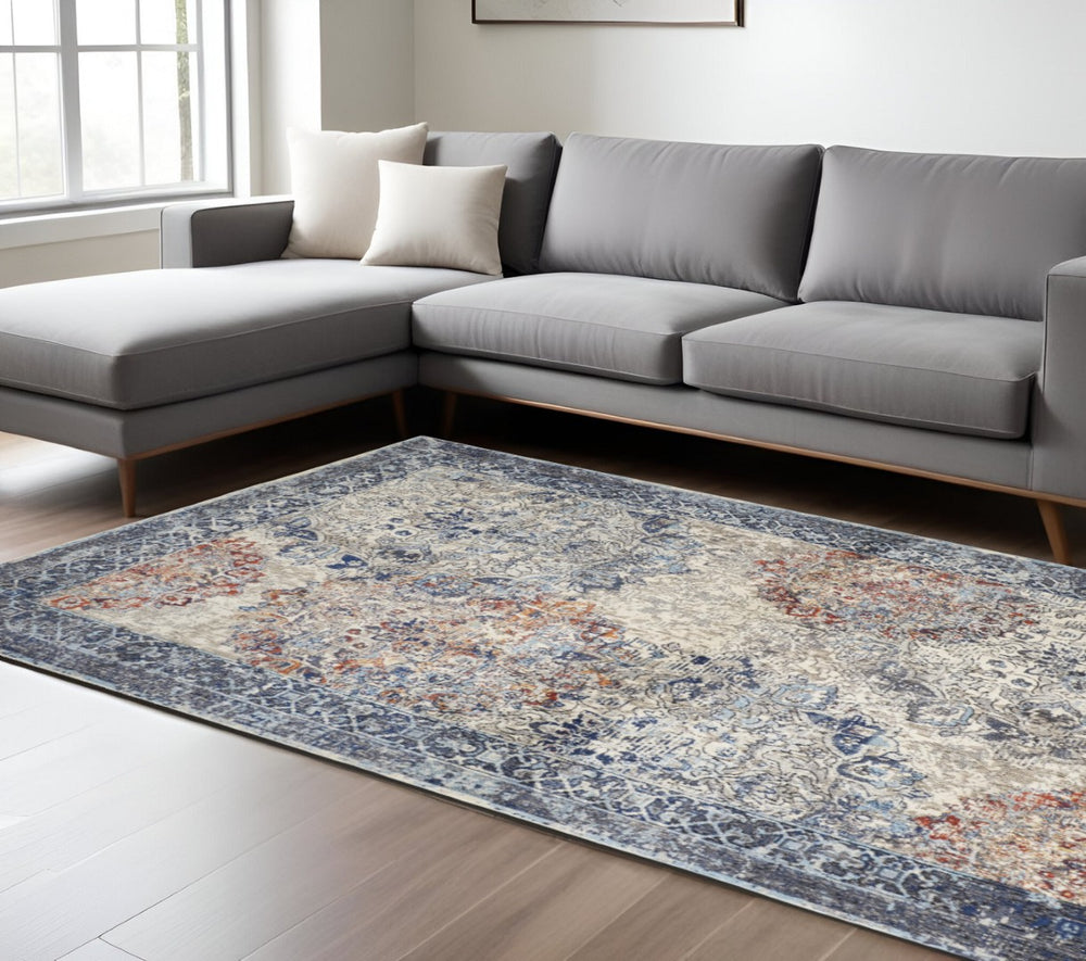 HomeRoots 7' Elegant Blue and Ivory Floral Power Loom Area Rug - Distressed, Non-Skid, Stain-Resistant Design 7' X 10' 513812