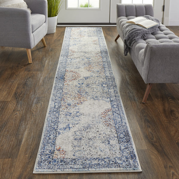 Homeroots 10' Blue Ivory And Red Floral Power Loom Distressed Stain Resistant Runner Rug  Polypropylene 513816