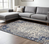 Homeroots 8' X 11' Gray And Ivory Floral Power Loom Distressed Non Skid Area Rug  Polypropylene 513820