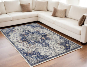 Homeroots 5' X 8' Gray Ivory And Blue Floral Power Loom Distressed Stain Resistant Area Rug  Polypropylene 513825