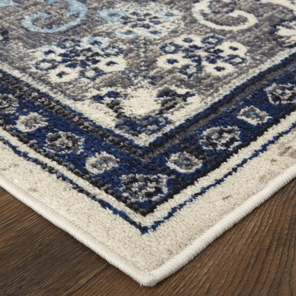 Homeroots 5' X 8' Gray Ivory And Blue Floral Power Loom Distressed Stain Resistant Area Rug  Polypropylene 513825