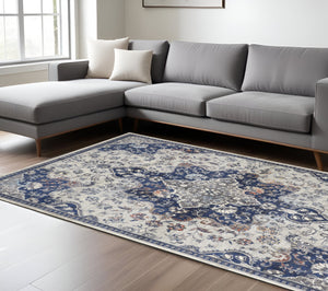 Homeroots 8' X 11' Blue And Ivory Floral Power Loom Distressed Non Skid Area Rug  Polypropylene 513827