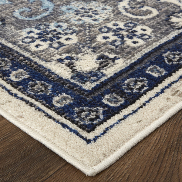 Homeroots 8' X 11' Blue And Ivory Floral Power Loom Distressed Non Skid Area Rug  Polypropylene 513827