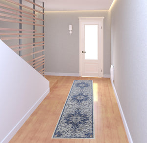 Homeroots 8' Gray Ivory And Blue Floral Power Loom Distressed Stain Resistant Runner Rug  Polypropylene 513829