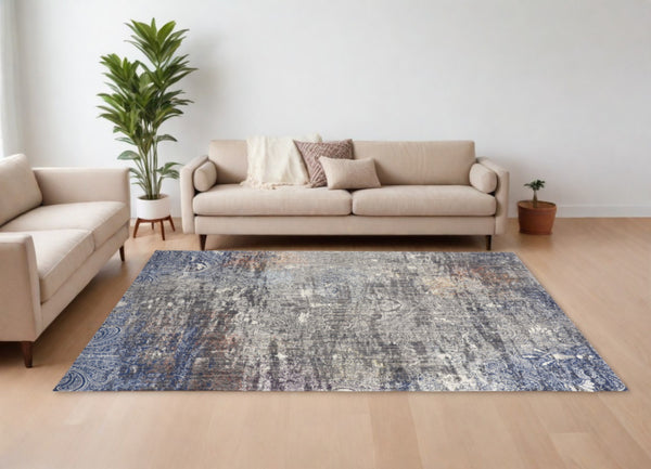 Homeroots 8' X 11' Taupe Blue And Ivory Abstract Power Loom Distressed Stain Resistant Area Rug  Polypropylene 513841