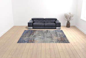 Homeroots 9' X 12' Taupe Blue And Ivory Abstract Power Loom Distressed Stain Resistant Area Rug  Polypropylene 513842