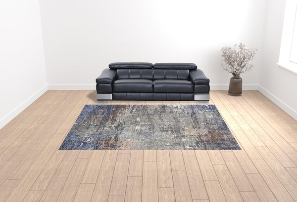 Homeroots 9' X 12' Taupe Blue And Ivory Abstract Power Loom Distressed Stain Resistant Area Rug  Polypropylene 513842