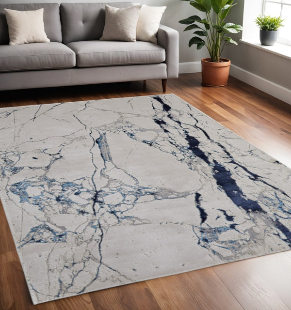 HomeRoots 4' Marble-Inspired Area Rug in Ivory and Blue - Distressed Design for Elegant Home Decor 5' X 8' 513887