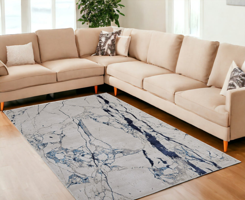 HomeRoots 4' Marble-Inspired Area Rug in Ivory and Blue - Distressed Design for Elegant Home Decor 9' X 12' 513890