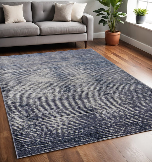 HomeRoots 4' Blue and Ivory Striped Area Rug - Distressed Power Loomed Design for Coastal Charm and Style 5' X 8' 513895