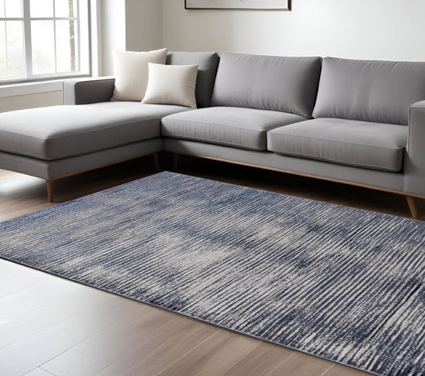 HomeRoots 4' Blue and Ivory Striped Area Rug - Distressed Power Loomed Design for Coastal Charm and Style 7' X 10' 513897