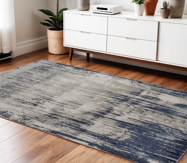 HomeRoots 4' Abstract Tan Blue Ivory Distressed Area Rug - Modern Power Loomed Design for Stylish Interiors 4' X 6' 513902