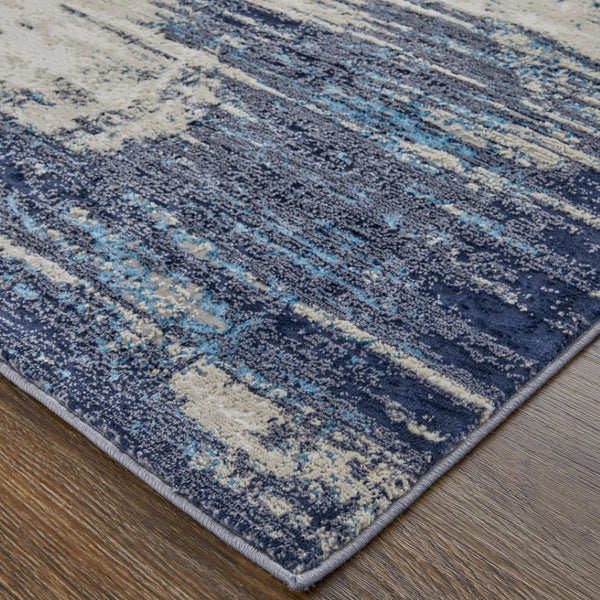 HomeRoots 4' Abstract Tan Blue Ivory Distressed Area Rug - Modern Power Loomed Design for Stylish Interiors 7' X 10' 513905