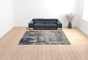 HomeRoots 4' Abstract Tan Blue Ivory Distressed Area Rug - Modern Power Loomed Design for Stylish Interiors 9' X 12' 513906