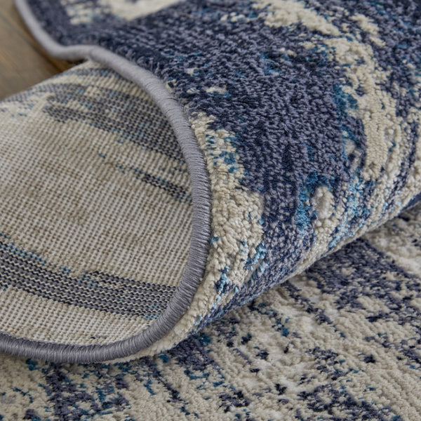 HomeRoots 4' Abstract Tan Blue Ivory Distressed Area Rug - Modern Power Loomed Design for Stylish Interiors 9' X 12' 513906